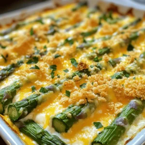 - 1 pound fresh asparagus, trimmed and cut into 2-inch pieces - 1 cup cooked quinoa or brown rice - 1 cup sharp cheddar cheese, shredded - ½ cup cream cheese, softened - 1 cup vegetable broth - 1 cup milk - 1 teaspoon garlic powder - 1 teaspoon onion powder - 1 tablespoon olive oil - Salt and pepper, to taste - ½ cup breadcrumbs (optional for topping) - Fresh parsley, chopped for garnish Gathering the right ingredients is key to making this cheesy asparagus casserole. Start with fresh asparagus. It is crisp and bright green. You can choose quinoa or brown rice, both add a hearty touch. Sharp cheddar cheese gives a rich flavor. Cream cheese makes the dish creamy and smooth. Don’t forget the vegetable broth and milk; they create the perfect base. Garlic and onion powders add depth. Use olive oil for a touch of warmth and flavor. Salt and pepper will enhance every bite. Breadcrumbs are optional but add a nice crunch on top. Finally, fresh parsley brightens the dish and adds color. Make sure you have all these items ready before you start cooking. This will help you stay organized and keep the process smooth. If you want to see the full recipe, check the previous section for step-by-step instructions. - 9x13 inch baking dish - Mixing bowls - Whisk - Measuring cups and spoons Having the right tools makes cooking easier. A 9x13 inch baking dish is perfect for this casserole. You will need mixing bowls to combine your ingredients. A whisk helps mix the cream cheese with the liquids until smooth. Measuring cups and spoons ensure you get the right amounts. With these tools, you will be ready to create a delicious dish. - Preheat the oven to 375°F (190°C). - In a large bowl, mix cream cheese, milk, and vegetable broth until smooth. This step is crucial for a creamy base. - Incorporate garlic powder, onion powder, salt, and pepper into the mixture. These spices add great flavor. - Next, add cooked quinoa or brown rice and half of the shredded cheddar cheese. Stir until everything is well combined. This adds texture and heartiness. - Fold in the asparagus pieces. Ensure they are evenly coated with the creamy mixture. - Transfer the mixture into a greased 9x13 inch baking dish. Spread it out evenly. - Sprinkle the remaining cheddar cheese over the top of the casserole. If you like a crunch, add breadcrumbs on top. - Drizzle olive oil evenly over the breadcrumbs. This helps them crisp up nicely. - Bake in the preheated oven for 25-30 minutes. Look for a bubbly casserole with a golden brown top. - Once done, let it cool slightly before serving. You can garnish with fresh parsley for a pop of color. For the full recipe, check out the provided link. To get the best results with your Cheesy Asparagus Casserole, cut the asparagus into even pieces. This helps it cook evenly. Aim for 2-inch pieces. Bigger pieces may not cook through, and smaller ones can get mushy. For a creamy texture, mix the cream cheese well with milk and broth. A smooth blend ensures every bite is rich and flavorful. Stir in the cheese gently to keep it fluffy. If you don’t have quinoa or rice, you can use couscous or barley. Both options add great texture. They also cook quickly, which saves time. For cheese, cheddar works well, but feel free to swap it out. Mozzarella offers a milder taste, while feta adds a tangy kick. Mixing different cheeses can also create a unique flavor profile. This casserole pairs nicely with grilled chicken or fish. The lightness of the meat complements the creamy dish. For side dishes, consider a simple green salad or roasted vegetables. These options add freshness and balance the richness of the casserole. Explore the [Full Recipe] for detailed cooking steps and more tips. {{image_2}} You can add seasonal veggies to your Cheesy Asparagus Casserole. Broccoli and peas work great. They add color and crunch. You can mix them in with the asparagus. Cheese choices can change the dish's taste. Try mozzarella for a milder flavor. Feta adds a salty kick. Each cheese brings a new twist to the casserole. If you need a gluten-free dish, switch breadcrumbs for gluten-free options. You can skip the breadcrumbs altogether for a lighter version. For vegetarians, use cashew cream instead of cream cheese. It gives a creamy texture and works well. Vegans can also enjoy this dish with plant-based cheese. To boost flavor, add spices like paprika or cayenne. Fresh herbs like thyme or basil can change the taste, too. Using flavored broths adds depth. You can try mushroom or garlic broth for a new flavor profile. These small tweaks can make your casserole special. For the full recipe, check [Full Recipe]. To keep your Cheesy Asparagus Casserole fresh, store leftovers right away. Let it cool for about 30 minutes after baking. Then, place it in an airtight container. This helps keep the flavors intact. You can also wrap it tightly in plastic wrap. Glass containers work best for leftovers, as they prevent odors. If stored properly, the casserole lasts about 3 to 5 days in the fridge. Always check for any signs of spoilage before eating. To reheat, preheat your oven to 350°F (175°C). Place the casserole in a baking dish and cover it with foil. Heat for 20-25 minutes, until it’s hot. You can also microwave individual portions for 1-2 minutes. You can freeze Cheesy Asparagus Casserole for up to 3 months. Make sure it cools completely before freezing. Use a freezer-safe container or wrap it well in plastic wrap and foil. When you’re ready to eat, thaw it overnight in the fridge. To reheat, follow the same oven method at 350°F (175°C). This ensures it stays creamy and delicious. For the full recipe, refer to the original document. Yes, you can prepare Cheesy Asparagus Casserole in advance. This makes dinner easier. To do this, follow these steps: - Make the casserole up to step 6. - Cover it tightly with plastic wrap. - Store it in the fridge for up to 24 hours. - When ready, bake it at 375°F (190°C) for 30-35 minutes. This method keeps the flavors fresh. You can even freeze it for longer storage. Cheesy Asparagus Casserole pairs well with many sides. Here are some great options: - A fresh green salad with a light vinaigrette. - Roasted chicken or turkey for a hearty meal. - Grilled shrimp or fish for a lighter touch. - Garlic bread or rolls to soak up the creamy sauce. These sides enhance the meal and provide balance. To check if your casserole is ready, look for these signs: - The top should be golden brown. - The edges should bubble slightly. - A knife inserted in the center should come out clean. To avoid overcooking, keep an eye on it in the last few minutes. Enjoy your delicious and creamy dish! If you want the full recipe, check [Full Recipe]. This Cheesy Asparagus Casserole is easy to make and very tasty. You just need some fresh asparagus, quinoa, and cheese. Follow the steps to mix, bake, and serve a delicious dish. Remember, you can switch up ingredients to match your taste. Perfecting this recipe will impress your family and friends. Enjoy your cooking adventure!