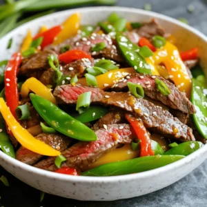 - 1 lb beef flank steak, thinly sliced - 1 cup orange juice (freshly squeezed for best flavor) - 2 tablespoons soy sauce For a great Orange Beef Stir Fry, you need beef flank steak. It gives the dish a nice texture. Orange juice adds a fresh, tangy taste. Soy sauce enhances the umami flavor, making it rich and savory. - 1 red bell pepper, julienned - 1 yellow bell pepper, julienned - 1 cup snap peas - 3 green onions, chopped (white and green parts separated) I love using bell peppers for color and crunch. Red and yellow bell peppers add sweetness. Snap peas bring a bright, fresh taste. Green onions add a hint of sharpness and freshness when garnished. - 2 tablespoons vegetable oil - 2 cloves garlic, minced - 1 inch piece ginger, grated - 1 tablespoon cornstarch - Sesame seeds for garnish Vegetable oil is perfect for high-heat cooking. Garlic and ginger bring warmth and depth to the dish. Cornstarch helps thicken the sauce, making it stick to the beef and veggies. Finally, sprinkle sesame seeds for a nutty finish and added crunch. For the complete cooking process, check the Full Recipe. To start, we need to marinate the beef. In a bowl, combine the sliced beef with the following: - 1 cup orange juice - 2 tablespoons soy sauce - 1 tablespoon cornstarch Mix well to coat the beef. Let it sit for at least 15 minutes. This helps the beef absorb nice flavors. Next, we cook the beef. Heat 1 tablespoon of vegetable oil in a large skillet over high heat. Once hot, add the marinated beef in a single layer. Sear it for about 2-3 minutes. Stir occasionally until it turns brown. Then, remove the beef and set it aside. Now, let’s stir-fry the veggies. In the same skillet, add 1 more tablespoon of oil. Toss in these ingredients: - 2 cloves garlic, minced - 1 inch piece ginger, grated - White parts of 3 green onions Stir-fry for about 30 seconds until you smell the garlic and ginger. Then, add: - 1 red bell pepper, julienned - 1 yellow bell pepper, julienned - 1 cup snap peas Stir-fry for 3-4 minutes. The veggies should be tender but still crisp. Now it’s time to mix everything. Add the cooked beef back into the skillet. Sprinkle in half of the orange zest. Stir everything together and cook for another 2-3 minutes to heat it through. Taste and adjust seasoning with soy sauce if needed. Finally, remove from heat. Garnish with the remaining orange zest, chopped green onions, and sesame seeds. For the full recipe, check the details above. Enjoy your meal! To get great flavor in your Orange Beef Stir Fry, marinate the beef well. I suggest at least 15 minutes of marinating time. For more flavor, you can marinate for up to an hour. Use freshly squeezed orange juice. It makes a big difference. The cornstarch helps the beef stay tender. Mix the marinade well to coat every slice of beef. Stir-frying is all about high heat and quick cooking. Use a large skillet or wok to give the beef room. Heat your oil until it shimmers. This means it's hot enough for cooking. Add the beef in a single layer. Do not stir too much at first. Let it brown for about 2-3 minutes. Then, stir to finish cooking. This keeps the beef tender and juicy. Serve your Orange Beef Stir Fry with rice or noodles. Jasmine rice pairs well for a light touch. You can also try egg noodles for a heartier meal. When plating, make it colorful. Use the bright colors of the peppers and green onions. A sprinkle of sesame seeds adds a nice crunch. This makes your dish look as good as it tastes. For the full recipe, check out the earlier sections! {{image_2}} You can change up the protein in this dish. Try chicken, shrimp, or tofu for a fresh twist. Each swap brings a different flavor and texture. For veggies, swap in broccoli, carrots, or mushrooms. Use what you have on hand or what you love. If you need a gluten-free meal, use tamari instead of soy sauce. You can also skip the cornstarch or use a gluten-free version. For a low-carb dish, replace rice with cauliflower rice. This keeps the meal light but still tasty. Want to spice things up? Try adding red pepper flakes or a dash of sriracha. You can also add more citrus with lime juice or zest. Mixing in hoisin sauce can add a sweet touch. These tweaks make every bite exciting and unique. To keep your Orange Beef Stir Fry fresh, follow these tips: - Place any leftovers in an airtight container. - Refrigerate within two hours of cooking. - Use within three to four days for the best taste. - For longer storage, freeze the stir fry. - Use freezer-safe bags or containers for freezing. Reheating your stir fry can be easy and quick: - Place leftovers in a skillet over medium heat. - Add a splash of water or broth to keep it moist. - Stir often until heated through, about 5 to 7 minutes. - You can also microwave it, covered, for 2-3 minutes. - Stir halfway to ensure even heating. When stored properly, your Orange Beef Stir Fry lasts: - In the fridge: 3 to 4 days. - In the freezer: up to 3 months. Always check for any off smells or changes in color before eating. Yes, you can use other cuts of beef. Flank steak works well, but you can try: - Sirloin - Skirt steak - Ribeye These cuts stay tender when cooked quickly. They soak up flavors nicely too. Absolutely! This recipe is great for meal prep. You can store it in the fridge for up to three days. Use airtight containers for best results. Reheat in the microwave or on the stove to keep it tasty. To add spice, try these tips: - Add red pepper flakes while cooking. - Use fresh chili peppers, like jalapeños or serranos. - Drizzle in some hot sauce before serving. Adjust the heat to match your taste. This stir fry pairs well with many sides. Here are a few popular options: - Steamed jasmine rice - Fried rice - Noodles - A simple cucumber salad Each side adds a nice touch to your meal. Check out the Full Recipe for more ideas! To sum up, making Orange Beef Stir Fry is simple and fun. You learned about key ingredients, like flank steak and bell peppers. I shared steps to marinate, cook, and stir-fry for the best taste. Tips for perfecting your dish and clever variations let you personalize your meal. Finally, I covered how to store and reheat leftovers for later. Enjoy exploring this dish and making it your own!