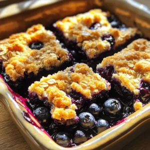 To make these easy blueberry pie bars, gather the following ingredients: - 2 cups fresh or frozen blueberries - 1 cup granulated sugar, divided - 2 tablespoons cornstarch - 1 tablespoon lemon juice - 1 teaspoon vanilla extract - 1 cup all-purpose flour - 1/2 cup rolled oats - 1/4 cup brown sugar - 1/2 teaspoon baking powder - 1/4 teaspoon salt - 1/2 cup unsalted butter, melted - 1/4 teaspoon cinnamon (optional) This list gives you all you need for a sweet, fruity treat. Not all ingredients need to be set in stone. Here are some easy swaps: - Granulated sugar: You can use coconut sugar for a richer flavor. - Cornstarch: Arrowroot powder works well as a thickener. - Lemon juice: Try lime juice for a twist on flavor. - All-purpose flour: Use almond flour for a gluten-free option. - Unsalted butter: Coconut oil is a great plant-based choice. These substitutions can help you tailor the recipe to your needs. Fresh blueberries are always a top choice, but frozen ones work just as well. Here’s what to consider: - Fresh blueberries: Look for firm, plump berries with a deep color. - Frozen blueberries: Opt for those without added sugar. They are picked at peak ripeness. Using the right blueberries enhances both flavor and texture in your bars. Start by rinsing your blueberries under cool water. If you use frozen ones, let them thaw and drain. In a medium bowl, mix the blueberries with 1/2 cup of granulated sugar, cornstarch, lemon juice, and vanilla extract. Stir gently until the blueberries are well-coated. This mixture will help thicken the filling as it bakes. Set it aside for a few minutes. In a large bowl, combine the flour, rolled oats, brown sugar, baking powder, salt, and cinnamon if you want a warm touch. Whisk these dry ingredients until mixed well. Pour in the melted butter and stir until you get a crumbly mixture. Save about 1/2 cup of this mixture for the topping. Press the rest firmly into the bottom of your greased baking dish to make the crust. Now, spread your blueberry mixture evenly over the crust. Crumble the reserved oat mixture on top of the blueberries. This creates a nice, crunchy topping. Preheat your oven to 350°F (175°C) and bake for 30-35 minutes. Look for a lightly golden topping and bubbling blueberries. After baking, let the pie bars cool for about 10 minutes in the dish. Then, transfer them to a wire rack to cool completely before cutting into squares. You can find the full recipe for this treat in the earlier sections. For a great crumb topping, use cold butter. Cold butter makes the topping flaky and crunchy. Cut the butter into small pieces before mixing it with the dry ingredients. This helps create those nice clumps. Make sure to reserve some of the crumb mixture for the topping. This will give your bars a nice finish. If your blueberry filling is too runny, add more cornstarch. Cornstarch helps thicken the filling as it bakes. If it’s too thick, add a little water or lemon juice. This will help loosen it up. Always let the filling sit for a few minutes before adding it to the bars. This gives it time to thicken. For this recipe, you'll need a few basic tools: - 8x8-inch baking dish - Mixing bowls - Whisk - Measuring cups and spoons - Parchment paper (optional for easy removal) These tools make the process simple and fun. Having the right tools helps you bake better. Trust me, you’ll enjoy your time in the kitchen! For the full recipe, check the complete guide. {{image_2}} You can change up the flavor by using other fruits. Raspberries, strawberries, or peaches work great too. Mix and match your favorites for a fun twist. For a berry medley, use a mix of blueberries and raspberries. Add the same amount as in the recipe. This keeps the sweetness and tartness balanced. To make these pie bars vegan, swap the butter for coconut oil or vegan butter. Use a flax egg instead of the regular egg for binding. If you need a gluten-free option, try using almond or oat flour. Both options will still give you a tasty treat without gluten. You can enhance the flavor by adding spices or extracts. A pinch of nutmeg or cardamom can bring warmth to the dish. If you want a citrus zing, add a bit of orange zest. You can also switch up the vanilla extract with almond or coconut extract. These small changes can create a whole new dessert experience. For the full recipe, refer to the link above. To keep your blueberry pie bars fresh, place them in an airtight container. You can store them at room temperature for up to 2 days. If you want to keep them longer, put them in the fridge. They will stay good for about a week in the fridge. Make sure the bars are cool before you cover them. This helps avoid extra moisture. Freezing blueberry pie bars is simple. First, let the bars cool completely. Then, cut them into squares. Wrap each square in plastic wrap. After that, place the wrapped bars in a freezer-safe bag or container. They can last up to 3 months in the freezer. When you are ready to eat them, just thaw them in the fridge overnight. To reheat your blueberry pie bars, you can use the oven or microwave. For the oven, preheat it to 350°F (175°C). Place the bars on a baking sheet and warm them for about 10 minutes. This keeps the crust crispy. If you use the microwave, heat one square at a time for about 20-30 seconds. Check to see if they are warm enough. Enjoy your blueberry pie bars warm for the best taste! For the complete recipe, check out the Full Recipe. Yes, you can use frozen blueberries. They work well in this recipe. Just add them directly from the freezer. You may need to bake a little longer. Frozen blueberries can release more juice. This can make the filling a bit runny. To fix this, add a touch more cornstarch. You will know the pie bars are done when the top is golden. The blueberries should bubble slightly. This usually happens in 30 to 35 minutes. A toothpick can help too. Insert it into the topping; it should come out clean. If it has wet batter, keep baking. Blueberry pie bars are tasty on their own. However, they pair well with ice cream. Vanilla or cinnamon flavors work great. You can also serve them with whipped cream. A sprinkle of lemon zest adds a nice touch too. Enjoy them with friends or family! You’ve learned how to make delicious blueberry pie bars. We covered the right ingredients, step-by-step instructions, and tips for the best results. Remember to try different fruits and variations. Storing and reheating properly keeps them tasty longer. If you follow these steps, you'll impress your friends and family. Enjoy your baking, and savor each bite with joy!