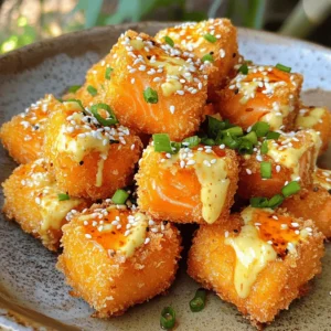 To make tasty Bang Bang Salmon Bites, you need a few key items. Here are the main ingredients: - 1 lb salmon fillet, skin removed and cut into bite-sized cubes - ½ cup cornstarch - 1 teaspoon garlic powder - 1 teaspoon paprika - ½ teaspoon salt - ½ teaspoon black pepper - 1 large egg, beaten - Vegetable oil for frying These items form the base of the dish. The salmon provides a rich flavor, while the cornstarch gives it a crispy texture. The Bang Bang sauce is what makes this dish special. Here’s what you need for the sauce: - ½ cup mayonnaise - 2 tablespoons sweet chili sauce - 1 tablespoon sriracha (adjust for spice preference) - 1 teaspoon lime juice - 1 teaspoon honey Mixing these ingredients creates a creamy and spicy sauce. It complements the salmon bites well and adds a burst of flavor. For a nice touch, consider adding garnishes. These are not required but can enhance your dish: - Chopped green onions - Sesame seeds These optional garnishes give a pop of color and extra flavor. They also make your dish look more appealing. For the full recipe, check out the detailed steps to create these delicious bites! To start, grab a small bowl. Combine the following: - ½ cup mayonnaise - 2 tablespoons sweet chili sauce - 1 tablespoon sriracha (adjust for spice preference) - 1 teaspoon lime juice - 1 teaspoon honey Mix these ingredients well. Taste the sauce and make changes if needed. Set it aside for later. This sauce adds a fun kick to our salmon bites. Now, let's get the salmon ready. You need to cut the salmon fillet into bite-sized cubes. In a new bowl, mix together: - ½ cup cornstarch - 1 teaspoon garlic powder - 1 teaspoon paprika - ½ teaspoon salt - ½ teaspoon black pepper In another bowl, beat one large egg. Dip each salmon cube into the egg first. After that, coat it in the cornstarch mix. Make sure each piece is covered well. Place the coated pieces on a plate. Next, heat up a large skillet. Pour in enough vegetable oil to cover about ½ inch of the bottom. Heat it on medium-high until shimmering. Once the oil is hot, add the salmon cubes in batches. Don’t overcrowd the pan. Fry each batch for about 2-3 minutes on each side. They should turn golden brown and be cooked through. After frying, remove them and place on paper towels to drain excess oil. Now it's time to serve! Place the crispy salmon bites on a serving plate. Drizzle your Bang Bang sauce over the top. For extra flavor and a nice look, you can sprinkle chopped green onions or sesame seeds. Enjoy this tasty snack with friends or family. For the full recipe, check out the complete instructions above. To get your salmon bites crispy, start with dry pieces. Pat the salmon cubes with paper towels. This step helps remove excess moisture. Use cornstarch as a coating. It creates a great crunch when fried. Heat your oil until it shimmers. A hot oil ensures a golden brown finish. Fry in small batches. Overcrowding the pan can lead to soggy bites. The Bang Bang sauce is key to this dish. You can make it as spicy as you like. Start with a small amount of sriracha. Taste the sauce and add more if needed. Mix well to ensure the flavors blend. Lime juice adds a nice tang. Honey gives it a sweet touch. You can even skip the sriracha for a milder sauce. If you have leftover salmon, use it wisely. Flake it into salads or tacos. You can even mix it into pasta for a quick meal. Just reheat gently to avoid dryness. The Bang Bang sauce works well with many dishes. It adds flavor to plain meals. Experiment with your leftovers for fun new snacks! For more details, you can check the full recipe. {{image_2}} If you want a lighter option, try baking the salmon bites. Preheat your oven to 400°F. Line a baking sheet with parchment paper. Place the coated salmon cubes on the sheet. Spray them lightly with cooking oil. Bake for 12-15 minutes or until golden and crispy. This method keeps the flavors rich while cutting back on oil. You can easily switch up the spices for more fun. Try adding cayenne for heat. If you love herbs, add dried dill or parsley to the cornstarch mix. For a smoky taste, try smoked paprika instead of regular paprika. Each change gives a unique twist to the dish, making it exciting every time. The Bang Bang sauce is tasty, but don’t stop there! Try serving with sweet chili sauce or a zesty yogurt dip. A soy sauce and ginger mix adds an Asian flair. You can even make a simple garlic aioli for a creamy touch. Each sauce brings out new flavors in your salmon bites. To store leftover salmon bites, place them in an airtight container. Make sure they cool down first. This keeps them fresh and tasty for later meals. You can keep them in the fridge for up to three days. Just remember to seal the container well to avoid any air getting in. If you want to save salmon bites for longer, freezing is a great option. First, let the bites cool completely. Then, arrange them in a single layer on a baking sheet. Freeze them for about an hour. Once frozen, transfer the bites to a freezer-safe bag. Be sure to remove as much air as possible. They can stay in the freezer for up to three months without losing flavor. For the best taste, reheat your salmon bites in the oven. Preheat your oven to 350°F (175°C). Place the bites on a baking sheet and heat for about 10-15 minutes. This method keeps them crispy. You can also use a microwave, but the bites may turn soft. If you use the microwave, heat them in short bursts to avoid overcooking. Enjoy those tasty bites again! For the complete recipe, check out the Full Recipe. Yes, you can make the Bang Bang sauce ahead of time. Mix the sauce and store it in the fridge. It stays good for about one week. This saves time on busy days. Just remember to give it a good stir before serving. The best salmon for this recipe is fresh, skinless salmon fillet. Look for wild-caught salmon if you can. It has great flavor and texture. Farmed salmon works too, but may have a different taste. Always check for bright color and firm texture. Yes, you can make a healthier version! Try baking the salmon bites instead of frying them. Use less oil and swap the mayonnaise for Greek yogurt in the sauce. This cuts down on calories while still keeping great taste. Leftovers can last about three days in the fridge. Store them in an airtight container. Reheat them in the oven or air fryer to keep them crispy. Avoid using the microwave, as it can make them soggy. In this post, we covered how to make Bang Bang Salmon Bites. You learned about key ingredients and how to prepare the tasty sauce. We also shared tips for crispy bites and variations like baking. I explained storage tips, answered common questions, and offered ways to enjoy leftovers. Now, you can create a delicious meal that’s quick and easy. Enjoy making and sharing this fun dish!