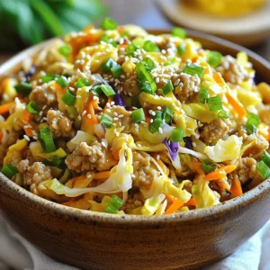 To make this easy egg roll in a bowl, you need a few key items: - 1 pound ground chicken or turkey - 4 cups coleslaw mix (or shredded cabbage and carrots) - 2 cloves garlic, minced - 1 tablespoon fresh ginger, grated These main ingredients bring the classic egg roll flavors right into your bowl. The ground meat gives it protein, while the coleslaw mix adds crunch and color. Garlic and ginger bring warmth and depth to the dish. You can add some optional items to boost the flavor: - 1 teaspoon sriracha for heat - Sesame seeds for garnish Sriracha adds a spicy kick if you like heat. Sesame seeds look great on top and add a nice crunch. To cook this dish, gather these essentials: - 1 tablespoon sesame oil - 1/4 cup low sodium soy sauce - 1 teaspoon rice vinegar Sesame oil gives a rich flavor that makes this dish special. Low sodium soy sauce keeps it savory without too much salt. Rice vinegar adds a hint of tang. For the full recipe, check out the details to create a delightful meal that’s quick and easy. To make this dish easy, start by preparing your ingredients. You will need to: - Mince 2 cloves of garlic. - Grate 1 tablespoon of fresh ginger. - Chop 2 green onions. Next, measure out the soy sauce, rice vinegar, and sriracha. Use low sodium soy sauce if you prefer. Having everything ready helps the cooking go smoothly. Now let’s cook! Heat 1 tablespoon of sesame oil in a large skillet over medium heat. Once hot, add the minced garlic and grated ginger. Sauté them for about 1 minute until you smell their great aroma. This step adds a lot of flavor. Then, add 1 pound of ground chicken to the skillet. Break it apart with a spatula. Cook it until it turns brown and is fully cooked, which will take about 5 to 7 minutes. Once the chicken is cooked, stir in 4 cups of coleslaw mix. Sauté this for another 2 to 3 minutes until the cabbage is slightly wilted. Pour in the soy sauce, rice vinegar, and sriracha (if you like it spicy). Mix everything well to combine the flavors. Let it simmer for about 2 minutes. This step allows all the tastes to blend together nicely. Now your Easy Egg Roll in a Bowl is ready to serve! Enjoy this tasty meal that is both quick and full of flavor. For the complete recipe, check out the Full Recipe section. To keep your veggies crisp, avoid cooking them too long. Stir them in the skillet just until they start to wilt. This usually takes about 2 to 3 minutes. You want the cabbage to stay bright and crunchy. For even-cooked meat, break the ground chicken or turkey into small pieces. Stir it often while cooking. This helps it brown nicely and ensures it cooks all the way through. For a beautiful presentation, serve the egg roll mix in individual bowls. Sprinkle sesame seeds on top for a nice touch. Adding extra green onions on the side can give your dish a fresh look. Pair your meal with a side of steamed rice or cauliflower rice. You can also serve it with a simple cucumber salad for a refreshing contrast. To make this dish vegetarian or vegan, swap the meat for tofu or tempeh. Use the same cooking method and enjoy the same flavors. If you like it spicy, add more sriracha or some red pepper flakes. If you prefer it milder, skip the heat and focus on the savory flavors. This recipe is flexible to your taste! For the full recipe, check out the Easy Egg Roll in a Bowl section. {{image_2}} You can switch up the protein in your Easy Egg Roll in a Bowl. Shrimp or tofu can make great alternatives. Shrimp adds a sweet and delicate taste, while tofu gives a nice texture. Just sauté them until cooked through. For meat lovers, ground beef or pork works well too. They bring a rich flavor and heartiness to the dish. Just brown them like you do with chicken or turkey. If you need gluten-free options, use tamari instead of soy sauce. This keeps the taste but removes gluten. For those on a low-carb or paleo diet, skip the soy sauce. Instead, use coconut aminos. You can also add cauliflower rice to replace the coleslaw mix. This keeps the meal light and healthy without losing flavor. Want to kick up the taste? Try adding spices like five-spice powder or crushed red pepper flakes. These can give your dish a nice kick. You can also add sauces like hoisin for a sweet touch. If you love veggies, toss in bell peppers, snap peas, or mushrooms. They add crunch and color, making the bowl even more appealing. Explore these options to create your perfect bowl, and check the Full Recipe for more ideas! To store leftovers, put the egg roll in a bowl in an airtight container. This keeps it fresh and prevents strong odors. I recommend using glass containers as they are durable and easy to clean. Make sure to let the dish cool to room temperature before sealing it. To freeze, place the cooled egg roll mixture in freezer-safe bags. Squeeze out as much air as you can to prevent freezer burn. Lay the bags flat in the freezer. When you're ready to eat, thaw it overnight in the fridge. For reheating, warm it in a skillet for the best texture. This helps keep the veggies crisp. In the fridge, your easy egg roll in a bowl lasts about 3 to 4 days. In the freezer, it can last up to 2 months. Always check for signs of spoilage. Look for changes in color or any strange smells. If it doesn’t look or smell right, it’s best to toss it out. How to make Easy Egg Roll in a Bowl vegetarian? To make this dish vegetarian, swap the ground chicken or turkey for tofu or tempeh. Crumble the tofu or cut the tempeh into small pieces. Cook it just like the meat in the recipe. This keeps the same great flavor while making it plant-based. Can I make this dish ahead of time? Yes, you can prepare it ahead of time. Cook the egg roll mix and store it in an airtight container. Keep it in the fridge for up to three days. When you are ready to eat, just reheat it in a pan or microwave. Is it healthy? Calorie count and macros This dish is healthy and packed with nutrients. A serving has about 300 calories. It offers protein, fiber, and vitamins from the veggies. You can check the exact macros on the full recipe. Tips for making it healthier To enhance health benefits, use lean ground turkey or chicken. You can also add more veggies, like bell peppers or snap peas. This boosts fiber and nutrient content without adding many calories. What kitchen tools do I need? You will need a large skillet, a spatula, and measuring cups. A good knife and cutting board help too. These tools will make the cooking process smooth and easy. Can I make this in one pan? Yes! This recipe is perfect for one-pan cooking. You cook all the ingredients in the same skillet, making cleanup quick and easy. Just follow the steps, and you will have a tasty meal in no time. In this blog post, we explored how to make a delicious Easy Egg Roll in a Bowl. You learned about the main and optional ingredients, like ground chicken and sriracha. We covered step-by-step instructions, cooking tips, and ways to customize the dish. You also found out how to store leftovers for freshness. This dish is tasty and easy to adapt for any diet. Enjoy making this recipe your own!