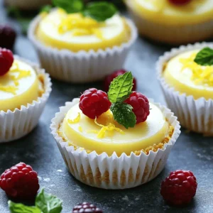 To make these delightful mini lemon cheesecakes, you will need: - 1 cup digestive biscuits, crushed - 1/4 cup unsalted butter, melted - 16 oz (450g) cream cheese, softened - 1/2 cup granulated sugar - 2 large eggs - Zest of 2 lemons - 1/4 cup fresh lemon juice - 1 teaspoon vanilla extract - 1/4 teaspoon salt - Fresh berries and mint for garnish Each ingredient plays a vital role in the flavor and texture of the cheesecakes. The digestive biscuits provide a crunchy and sweet base. The unsalted butter helps bind the crumbs together. Cream cheese is the star; it should be soft for a smooth filling. Granulated sugar adds sweetness, while eggs act as a binder. Lemon zest gives a bright flavor, and fresh lemon juice balances the sweetness. Vanilla extract enhances all the tastes, and salt brings everything together. You can swap digestive biscuits for graham crackers if you prefer a different crust flavor. Use coconut oil instead of butter for a dairy-free option. For a lighter cheesecake, consider using Greek yogurt in place of some cream cheese. If you want a sweeter cheesecake, add a little more sugar. For a fun twist, try adding a splash of berry puree to the cheesecake mix. Check out the Full Recipe for more insights and tips! Start by preheating your oven to 325°F (160°C). Line a muffin tin with paper liners. In a bowl, mix 1 cup of crushed digestive biscuits with 1/4 cup of melted butter. Stir until the crumbs are evenly coated. Next, take about a tablespoon of this mixture and press it into each muffin liner. Make sure it’s compact and smooth. In a large bowl, beat 16 oz of softened cream cheese with 1/2 cup of granulated sugar. Mix until the texture is smooth and creamy. Add 2 large eggs, mixing well after each one. Now, stir in the zest of 2 lemons, 1/4 cup of fresh lemon juice, 1 teaspoon of vanilla extract, and 1/4 teaspoon of salt. Ensure all ingredients are blended well. Pour the cheesecake filling over the crust in each muffin liner. Fill them about 3/4 full. Bake in the preheated oven for 18 to 20 minutes. The centers should be slightly jiggly, not liquid. After baking, remove the tray from the oven. Let the cheesecakes cool at room temperature. Then, refrigerate them for at least 2 hours to set. Once chilled, gently take them out of the muffin tin. You can garnish with fresh berries and mint before serving. For the complete recipe, check [Full Recipe]. To make sure your mini lemon cheesecakes are smooth, use room temperature cream cheese. Cold cream cheese makes lumps. Beat it well with sugar until creamy. Mix in eggs slowly. Add them one at a time. This helps avoid over-mixing, which can make them dense. Don't forget to mix in the lemon juice and zest gently. This way, you keep that light, creamy texture. One common mistake is not baking long enough. If they are too soft, they won’t set right. Check them when they jiggle slightly in the center. Another mistake is over-mixing your batter. This can make your cheesecakes tough. Lastly, be careful when cooling them. Let them cool at room temperature first before chilling. This helps prevent cracks on the surface. These mini lemon cheesecakes shine with fresh berries on top. Raspberries, strawberries, or blueberries add great color. A sprig of mint adds a lovely touch too. You can also serve them with whipped cream for extra fluff. For drinks, pair them with iced tea or lemonade. The lemon flavor will balance nicely. For a fun twist, try them with a berry sauce drizzled on top. Explore your creativity with these little delights! {{image_2}} You can change the flavor of these mini cheesecakes easily. Try using lime for a zesty twist. Coconut gives a tropical taste that pairs well with the cream cheese. For chocolate lovers, mix in melted chocolate or cocoa powder for rich flavor. You can also add fruit purees, like strawberry or raspberry, to the cheese mix. Each option brings a new taste and makes them exciting. If you need a gluten-free version, swap the digestive biscuits for gluten-free graham crackers. You can also use almond flour mixed with melted butter for the crust. This change keeps the base tasty and gluten-free. Always check labels to ensure all ingredients are safe for your diet. This way, everyone can enjoy these yummy treats. Presentation matters. To make your mini cheesecakes look special, use fresh berries on top. A sprig of mint adds color and freshness. You can also drizzle some fruit sauce on the plate before placing the cheesecake. Use a fancy cupcake liner for a touch of style. For a fun look, create a mini cheesecake tower by stacking them. These simple ideas make your desserts stand out. For the full recipe, make sure to follow the steps carefully and enjoy your creation! To keep your mini lemon cheesecakes fresh, store them in the fridge. Use an airtight container for best results. Place a piece of parchment paper between layers if stacking. This prevents them from sticking together. You can also cover them with plastic wrap. This keeps moisture out and flavors in. You can freeze mini lemon cheesecakes if you want to save some for later. First, let them cool completely. Then, wrap each cheesecake in plastic wrap tightly. After that, place them in a freezer-safe bag or container. Label the bag with the date. They can last in the freezer for up to three months. When ready to eat, thaw them in the fridge overnight. Mini lemon cheesecakes can last for up to five days in the fridge. Check for any signs of spoilage before serving. If you notice any changes in smell or texture, it's best to discard them. For the best taste and texture, enjoy them within the first three days. Always keep them covered to maintain freshness. For the full recipe, refer to the earlier sections. Yes, you can! Try using graham crackers or Oreo cookies. Both options add unique flavors. You can also use a nut crust for a gluten-free choice. Just crush the nuts finely and mix with melted butter. This will give your mini cheesecakes a tasty twist! Making these cheesecakes ahead is easy! Prepare them a day in advance. After baking, let them cool and chill in the fridge. They will taste even better after sitting overnight. Just remember to add toppings right before serving for the best look. Toppings can make these cheesecakes shine! Fresh berries like strawberries or blueberries add color and flavor. You can also use whipped cream for a creamy touch. Mint leaves bring a fresh pop. For a fun twist, try lemon curd or a drizzle of honey. Yes, you can use low-fat cream cheese. It will still taste great. The texture may be a bit different but will still produce a tasty cheesecake. Just ensure it’s softened to mix well. After baking, let the cheesecakes cool at room temperature for about 30 minutes. Then, refrigerate them for at least 2 hours. This cooling time helps set the cheesecake and allows flavors to blend well. Absolutely! Doubling the recipe is simple. Just make sure you have a larger muffin tin or use multiple tins. Adjust your baking time if needed. Always check for doneness using a toothpick. If you don’t have muffin liners, you can grease the muffin tin with butter or cooking spray. This will help the cheesecakes release easily after baking. Just be gentle when removing them to keep their shape. Cheesecakes are done when the edges are set, and the center is slightly jiggly. They will firm up as they cool. Avoid overbaking, as this can lead to cracks and a dry texture. These cheesecakes pair nicely with iced tea or lemonade. A light sparkling wine is also a great choice. These drinks complement the lemon flavor and keep things refreshing. For the full recipe, you can check the section above. Enjoy your baking! You now have everything needed to make delicious mini lemon cheesecakes. We covered the key ingredients, step-by-step instructions, and helpful tips. Remember, small details make a big difference. Avoid common mistakes for the best results. Don’t hesitate to try different flavors and toppings for fun. Lastly, store these treats properly to keep them fresh. Enjoy your cheesecake journey!