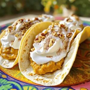 - 1 cup pumpkin puree - 1/2 cup sweetened condensed milk - 1/3 cup brown sugar - 1 teaspoon pumpkin pie spice - 1 teaspoon vanilla extract - 8 small flour tortillas - 1/2 cup whipped cream - 1/4 cup chopped pecans (optional) - Cinnamon for dusting To start, grab a medium bowl. In this bowl, combine the pumpkin puree, sweetened condensed milk, brown sugar, pumpkin pie spice, and vanilla extract. Use a whisk to mix until it is smooth. You want the filling to be creamy and well-blended. This will be the heart of your tacos, so take your time to get it just right. Next, it's time to warm the tortillas. Use a dry skillet and heat it over medium heat. Place each tortilla in the skillet for about 30 seconds on each side. This helps them become soft and pliable. Warm tortillas are key to making tacos that hold their shape. Keep them wrapped in a clean towel to stay warm. Now, let's assemble the tacos! Spoon a generous amount of the pumpkin filling onto the center of each tortilla. Fold the tortilla in half to create a taco shape. Press down gently to secure the filling inside. Serve the tacos while they are warm. Top each one with a dollop of whipped cream and a sprinkle of chopped pecans if you like. Dust lightly with cinnamon for that extra touch. For the full recipe, check out the details above to make these delicious treats at home! To enhance the taste of your pumpkin pie tacos, add a pinch of salt. It brightens the flavor. For a richer taste, try using fresh pumpkin puree instead of canned. Roasting your pumpkin first brings out its natural sweetness. Adjusting sweetness is easy. If you want a sweeter taco, add more brown sugar or sweetened condensed milk. Taste the filling before you fill the tortillas. This way, you can ensure it’s just right for your preference. Make your tacos pop by using a colorful platter. Arrange the tacos in a circle or a line. Garnish with extra chopped pecans and a dusting of cinnamon to make them inviting. You can serve these tacos with a side of whipped cream for dipping. This adds a fun twist. Pair them with a warm drink, like apple cider, to boost the fall vibes. After making your pumpkin pie tacos, store any leftovers in the fridge. Use an airtight container to keep them fresh. This way, they won’t dry out or pick up other smells. You can enjoy your tacos for up to three days. Just make sure to check for any signs of spoilage before eating. To reheat your tacos, I suggest using the oven or a skillet. Both methods keep the texture nice. If using the oven, preheat it to 350°F (175°C). Heat the tacos for about 10 minutes. For a skillet, warm it over medium heat. Reheat for about 3-4 minutes on each side. Always check that the filling is hot before serving. Enjoy your delicious pumpkin pie tacos! For the full recipe, check out the instructions above. {{image_2}} Finding pumpkin pie tacos can be a fun adventure. Start with local restaurants and food trucks. Many places offer their own twist on this fall treat. Look for popular spots in your area. Some might serve pumpkin pie tacos as a special. Others may include them on their regular menu. Here are a few recommendations: - Taco Town: Known for their creative tacos, they have a seasonal pumpkin taco. - Sweet Treats Food Truck: This truck often pops up at local events. Their pumpkin pie tacos are a fan favorite. These places often use fresh, local ingredients. They might pair the tacos with unique toppings or sauces. Be sure to ask about their special offerings! The internet is a treasure for food lovers. Check websites and blogs for recipes and reviews. Here are some sites to explore: - Food Network: They have many recipes and cooking tips for pumpkin treats. - Pinterest: Searching for pumpkin pie tacos here will show you various recipes. Social media is also great for finding inspiration. Follow accounts that share seasonal foods. Instagram and TikTok have many food creators who post fun ideas. You can even find short videos showing how to make your own tacos. For a detailed recipe, check out the Full Recipe. This will guide you in making these delightful bites at home! To make Pumpkin Pie Tacos, you start with the filling. Mix together pumpkin puree, sweetened condensed milk, brown sugar, pumpkin pie spice, and vanilla extract in a bowl. Whisk until you have a smooth blend. Next, warm flour tortillas in a skillet. Heat each side for about 30 seconds. This makes them soft and easy to fold. Spoon the pumpkin filling onto the center of each tortilla. Fold the tortilla in half to create a taco. Press it down gently to keep the filling inside. Serve them warm with whipped cream and chopped pecans on top. Dust with cinnamon for extra flavor. You can follow the Full Recipe for detailed steps. Yes, you can get creative with fillings! Try using apple pie filling for a fruity twist. Chocolate filling can add a rich taste that many enjoy. For a twist, mix cream cheese with cinnamon and sugar for a creamy option. Pair these with seasonal flavors like caramel or nutmeg for added depth. You can even try savory fillings like spiced sweet potatoes. The options are endless. Get inspired by what’s fresh and available. Absolutely! You can prepare the filling a day ahead. Store it in an airtight container in the fridge. When you're ready to assemble, warm your tortillas. Fill them up and serve. If you have leftover tacos, wrap them up well. Store them in the fridge for a couple of days. To enjoy them later, reheat them in a skillet. This keeps the tortillas soft and tasty. Always ensure they are heated through before serving. Pumpkin pie tacos combine tasty pumpkin filling with warm tortillas. We covered key ingredients like pumpkin puree and brown sugar to create a delicious treat. You learned how to prepare the filling, warm the tortillas, and assemble them beautifully. Remember, you can customize your tacos with different tortillas or toppings. Try adding flavored extracts for an extra twist. Enjoy these tasty tacos yourself or share them with friends. They’ll love this fun twist on a classic dessert!