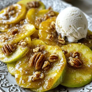 To make Southern fried apples, you will need the following ingredients: - 4 medium-sized Granny Smith apples, peeled, cored, and sliced - 1 teaspoon lemon juice - 1/2 cup brown sugar - 1 teaspoon ground cinnamon - 1/4 teaspoon ground nutmeg - 2 tablespoons unsalted butter - 1 tablespoon vegetable oil - Pinch of salt You can enhance your dish with these optional ingredients: - Chopped pecans for garnish - Vanilla ice cream for serving When making fried apples, I always choose Granny Smith apples. They are tart and firm, which helps them hold their shape while cooking. Look for apples that are bright green and free of bruises. You can also try Honeycrisp or Fuji apples for a sweeter flavor. Just remember, the right apple makes all the difference in taste and texture. Start by peeling and coring the apples. Use four medium-sized Granny Smith apples for the best taste. Next, slice them into thin wedges. Place the apple slices in a large bowl. Add a teaspoon of lemon juice. This will keep the apples from turning brown and adds a nice zing. Toss the apples gently so they are well-coated with the juice. Now, let’s cook the apples! In a separate bowl, mix half a cup of brown sugar, one teaspoon of ground cinnamon, one-fourth teaspoon of ground nutmeg, and a pinch of salt. Stir these together until they blend well. Heat a large skillet over medium heat. Add two tablespoons of unsalted butter and one tablespoon of vegetable oil. Wait for the butter to melt and bubble. Carefully add the sliced apples to the skillet, spreading them out evenly. Sprinkle the brown sugar mixture over the apples. Gently stir to coat all the apple slices. Cook for about 10 to 12 minutes. Stir occasionally, so the apples don’t stick. They should become tender and caramelized, but not mushy. Once they are cooked, take the skillet off the heat and let the apples cool for a few minutes. Serve the warm apples right from the skillet. For a special touch, sprinkle chopped pecans on top. You can also add a scoop of vanilla ice cream for a creamy contrast. This recipe is comfort food at its best. Enjoy every bite of your Southern fried apples! For the full recipe, click [Full Recipe]. To get the best caramelized apples, follow these steps. Use Granny Smith apples, as they are tart and hold their shape. First, toss the sliced apples with lemon juice. This helps keep them fresh and bright. When cooking, use a mix of butter and vegetable oil. This mix prevents burning and adds flavor. Cook the apples on medium heat. Stir gently to avoid breaking them. Watch closely as they cook. You want them tender, not mushy. The key is to let the sugar mix melt and bubble around the apples. This forms a nice caramel layer. If you cook them too long, they will lose their shape. Here are some common mistakes to watch out for. First, do not skip the lemon juice. It brightens the flavor and keeps the apples from browning. Also, avoid using too much heat. High heat can burn the sugar and ruin the dish. Another mistake is not stirring enough. Stirring helps coat the apples evenly. If you don't stir, some apples may burn while others stay raw. Lastly, don't rush the cooking time. Give the apples enough time to soften and caramelize beautifully. Spices can really elevate your southern fried apples. Cinnamon is a must-have, but don’t stop there. Adding nutmeg gives a warm, earthy flavor that rounds out the dish. You can even try a pinch of ginger for a little kick. If you want to get creative, think about adding vanilla extract. Just a splash can make a big difference. You can also toss in some chopped pecans for crunch. Top it all off with vanilla ice cream for a treat that feels special. For the full recipe, check the details above. {{image_2}} You can make Southern fried apples even better by adding more ingredients. For a crunchy twist, toss in some chopped pecans. They add a nice texture and flavor. If you love vanilla, drizzle some over the apples while they cook. It makes them taste even sweeter. You could also add a splash of maple syrup for extra sweetness. Each of these options adds a unique touch to the dish. Southern fried apples can differ across regions. In some parts, folks add a splash of bourbon for a rich flavor. This gives the dish a nice kick. Others might use different apples, like Honeycrisp or Fuji, for a sweeter taste. Some might even throw in a pinch of cayenne pepper for heat. These regional twists show how versatile this dish can be. Southern fried apples pair well with many foods. They go great with breakfast dishes like pancakes or waffles. You can also serve them as a side with pork chops. The sweetness of the apples balances the savory meat. For dessert, try them with a scoop of vanilla ice cream. This mix makes for a delightful treat. You can find the full recipe and enjoy this comfort food treat in many ways! Let your fried apples cool to room temperature. This stops steam from making them soggy. Place them in an airtight container. Store them in the fridge for up to three days. If you want to keep them longer, freezing is a great option. To reheat, gently warm the apples on the stove over low heat. Stir them often to heat evenly. You can also use a microwave. Heat them in 30-second bursts, stirring in between. Add a bit of butter for extra flavor and moisture. To freeze, place the cooled apples in a freezer-safe bag. Remove as much air as you can. They will keep in the freezer for up to three months. When ready to use, thaw them in the fridge overnight. Reheat them on the stove or in the microwave for a tasty treat. For the full recipe, check the listed instructions above. Southern Fried Apples shine as a dessert. They pair well with vanilla ice cream. The warm apples contrast nicely with the cold ice cream. You can also serve them with pancakes or waffles. They add a sweet touch to breakfast. Some love them with biscuits or cornbread. They bring a taste of the South to any meal. Yes, you can use other apples. Granny Smith apples work best for their tartness. However, you can try Fuji or Honeycrisp apples. These apples add a nice sweetness. Just remember, the texture may change a bit. Softer apples might turn mushy when cooked. Stick with firm apples for the best results. Southern Fried Apples can last up to five days in the fridge. To store them, let them cool down first. Place them in an airtight container. This keeps them fresh and tasty. When reheating, use low heat to warm them up. They can taste just as good the next day! You can also find the Full Recipe for more detailed instructions. In this article, you learned how to make Southern fried apples, including needed ingredients and cooking steps. I shared tips for achieving the best caramelization and how to enhance flavor with spices. You also discovered variations that add new twists and how to store leftovers. Southern fried apples are tasty and fun to make. Enjoy your dish and share it with friends!