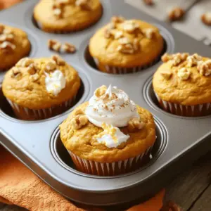 - 1 ½ cups all-purpose flour - 1 teaspoon baking powder - ½ teaspoon baking soda - 1 teaspoon ground cinnamon - ½ teaspoon ground nutmeg - ¼ teaspoon ground ginger - ½ teaspoon salt - ½ cup granulated sugar - ½ cup brown sugar, packed - 1 cup pumpkin puree (canned or fresh) - 2 large eggs - ½ cup vegetable oil - 1 teaspoon vanilla extract - 4 oz cream cheese, softened and cubed - Optional toppings: Chopped walnuts or pecans To make pumpkin cream cheese muffins, you need a few simple ingredients. The dry mix creates the base for the muffins. All-purpose flour gives the muffins their structure. Baking powder and baking soda help them rise. Spices like cinnamon, nutmeg, and ginger add warmth and flavor. Salt enhances the sweetness. Next, you have the wet ingredients. Granulated and brown sugar bring sweetness and moisture. Pumpkin puree gives the muffins their rich flavor and color. Eggs help bind everything together, while vegetable oil keeps them soft. Vanilla extract adds a nice touch of flavor. Finally, the cream cheese filling is the star. Softened cream cheese adds a creamy, rich center. You can also top the muffins with walnuts or pecans for added crunch. These ingredients mix together to create a delightful fall treat. They combine flavors and textures to make every bite a joy. - Preheat the oven to 350°F (175°C). - Line a 12-cup muffin tin with paper liners or spray with non-stick cooking spray. Make sure your oven is hot before baking. This step helps the muffins rise well. Lining the tin makes it easy to take out the muffins later. - Whisk together all dry ingredients until combined. In a medium bowl, mix 1 ½ cups of flour, 1 teaspoon of baking powder, ½ teaspoon of baking soda, 1 teaspoon of cinnamon, ½ teaspoon of nutmeg, ¼ teaspoon of ginger, and ½ teaspoon of salt. This mix gives your muffins flavor and helps them rise. - Mix granulated sugar, brown sugar, pumpkin puree, eggs, vegetable oil, and vanilla until smooth. In a large bowl, blend ½ cup of granulated sugar, ½ cup of brown sugar, 1 cup of pumpkin puree, 2 eggs, ½ cup of vegetable oil, and 1 teaspoon of vanilla extract. Stir until there are no lumps. This mix adds moisture and sweetness. - Gradually add dry ingredients to wet, mixing gently. Slowly add the dry mix to the wet mix. Stir gently until just combined. Be careful not to overmix. A few lumps are fine. This step keeps your muffins soft. - Fold in cubed cream cheese gently. Take 4 oz of softened cream cheese and cut it into small cubes. Gently fold it into the batter. This creates creamy pockets in your muffins. It adds richness and flavor. - Divide batter into muffin cups and bake for 18-20 minutes. Scoop the batter into the muffin cups, filling each about two-thirds full. Bake in your preheated oven for 18 to 20 minutes. Check with a toothpick in the center. If it comes out clean, your muffins are done! Let the muffins cool for a few minutes before taking them out of the tin. Enjoy the warm, spiced aroma as they bake! Measuring ingredients is key for great muffins. Use dry measuring cups for flour and sugar. Fill the cup, then level it off. This step keeps the muffin batter from being too thick or too thin. Too much flour can make your muffins dry. So, always measure with care to get the best results. To check if muffins are done, use a toothpick. Insert it into the center of a muffin. If it comes out clean, your muffins are ready. If it has batter on it, bake a few more minutes. Keep an eye on them during the last few minutes. Each oven is different, so adjust the time as needed. Mixing your batter too much can spoil the texture. Stir just until the dry and wet ingredients combine. A few lumps are okay. This keeps the muffins light and fluffy. Gently fold in the cream cheese to create tasty pockets. Avoid overmixing at all costs; it’s a common mistake! {{image_2}} If you want a nut-free version of these muffins, it's easy. Just leave out the nuts completely. You can also swap in seeds, like pumpkin or sunflower seeds, for a nice crunch. This keeps the muffins safe for those with nut allergies. Plus, you still get that lovely texture. To make these muffins healthier, consider using whole wheat flour instead of all-purpose flour. Whole wheat flour adds fiber and nutrients. You can also use natural sweeteners. Try honey or maple syrup instead of granulated sugar. This choice adds flavor and cuts refined sugars. Your muffins will still taste great! Want to boost the flavor? Add more spices! A pinch of allspice or cloves pairs well with pumpkin. You can also mix in chocolate chips or dried cranberries. These add sweetness and extra texture. Experiment with different flavors to make your muffins unique. Enjoy the process of creating your perfect treat! To keep your pumpkin cream cheese muffins fresh, store them in an airtight container. Place parchment paper between layers to prevent sticking. Keep them at room temperature for up to three days. If you want them to last a bit longer, put them in the fridge. This way, you can enjoy them for about a week. If you have extra muffins, freezing them is a great option. Let the muffins cool completely first. Wrap each muffin tightly in plastic wrap. Then, place them in a freezer bag or container. They can last for up to three months in the freezer. When you want to enjoy one, simply thaw it in the fridge overnight and reheat it in the microwave or oven. To keep your muffins moist, add a slice of bread in the storage container. The bread helps keep the muffins soft. Avoid refrigerating them if you plan to eat them soon, as this can dry them out. Enjoy your muffins warm for the best taste! Yes, you can use fresh pumpkin. Start by choosing a sugar pumpkin. These are small and sweet. Cut it in half and remove the seeds. Roast the halves in the oven at 350°F for about 45 minutes. Once soft, scoop out the flesh. Puree it in a blender until smooth. Use this fresh pumpkin puree in your muffins. It adds a lovely taste and texture. To check if your muffins are done, use a toothpick. Insert it into the center of a muffin. If it comes out clean or with a few crumbs, they are ready. If the toothpick has wet batter, bake them for a few more minutes. Keep an eye on them, as every oven varies. The muffins should also be golden and spring back when touched. Yes, you can substitute cream cheese. Here are a few options: - Use Greek yogurt for a tangy twist. - Try ricotta cheese for a lighter filling. - Use mascarpone for a rich, creamy taste. Each of these adds a unique flavor and keeps the muffins moist. You have learned how to create delicious pumpkin muffins. We covered ingredients, step-by-step baking, storage, and fun variations. Always measure carefully for the best results. Remember, slight changes can also yield great flavors. Enjoy experimenting with add-ins or alternative ingredients. Your muffins will be delightful treats to share! Keep these tips in mind to ensure every batch is a success. Happy baking!