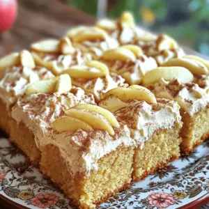 - 2 cups unsweetened applesauce - 1 ½ cups all-purpose flour - 1 cup granulated sugar - ½ cup brown sugar, packed - ½ cup vegetable oil - 3 large eggs - 1 teaspoon vanilla extract The main star of this cake is the applesauce. It adds moisture and a natural sweetness. I love using unsweetened applesauce to keep the cake balanced. The combination of granulated and brown sugar gives it a rich flavor. - 8 oz cream cheese, softened - ½ cup unsalted butter, softened - 4 cups powdered sugar - 1 teaspoon vanilla extract - 1 teaspoon ground cinnamon For the frosting, softened cream cheese and butter mix well. The powdered sugar sweetens it just right. Ground cinnamon adds a warm spice that pairs perfectly with the cake. - Sprinkle of cinnamon - Thin slice of apple for garnish - Chopped nuts for added texture You can sprinkle a little cinnamon on top for flair. A thin slice of apple makes a lovely garnish. Chopped nuts add a delightful crunch and flavor. These extras can really elevate your cake. 1. Preheat your oven to 350°F (175°C). Grease and flour a 9x13-inch baking dish. 2. In a large bowl, whisk together: - 1 ½ cups all-purpose flour - 1 teaspoon baking soda - 1 teaspoon baking powder - 1 teaspoon ground cinnamon - ½ teaspoon ground nutmeg - ½ teaspoon salt 3. In another bowl, combine: - 2 cups unsweetened applesauce - 1 cup granulated sugar - ½ cup brown sugar, packed - ½ cup vegetable oil - 3 large eggs - 1 teaspoon vanilla extract Mix until everything is well blended. 1. Gradually fold the dry ingredients into the wet mixture. Stir until just combined. 2. Pour the batter into your prepared dish. Spread the batter evenly. 3. Bake for 30 to 35 minutes. Check doneness with a toothpick. It should come out clean. 4. Cool the cake in the pan for 15 minutes. Then, transfer it to a wire rack to cool completely. 1. In a large bowl, beat together: - 8 oz cream cheese, softened - ½ cup unsalted butter, softened Beat until smooth and creamy. 2. Gradually add in 4 cups powdered sugar. Mix until fully combined. 3. Stir in: - 1 teaspoon vanilla extract - 1 teaspoon ground cinnamon Continue mixing until the frosting is completely smooth. Once your cake cools, spread the frosting evenly across the top. Enjoy your delightful cake! - Use room temperature ingredients: Bring your eggs and cream cheese to room temp. This helps them mix well and makes a smoother batter. - Do not overmix the batter: Mix just until combined. Overmixing can make the cake tough. - Check for doneness using the toothpick method: Insert a toothpick in the center. If it comes out clean, your cake is ready! - Substitute half of the granulated sugar for brown sugar: Brown sugar adds moisture, making your cake softer and sweeter. - Add a dash of vanilla extract to the cake batter: This simple addition can boost the cake’s flavor profile. - Ensure cream cheese and butter are softened: Soft ingredients mix better. Leave them out for about 30 minutes before mixing. - Chill the frosting for a few minutes if too soft: If your frosting is runny, pop it in the fridge for a bit. This will help it firm up for spreading. {{image_2}} You can add fun flavors to your applesauce cake. Chopped nuts, like walnuts or pecans, bring a nice crunch. They add texture and flavor. You can also mix in raisins or dried cranberries. This makes the cake sweeter and fruitier. Both options work well and make the cake more exciting! If you need a gluten-free cake, just swap the all-purpose flour with gluten-free flour. This simple switch keeps the cake soft and tasty. For a vegan version, use a dairy-free cream cheese alternative. This way, everyone can enjoy the cake, no matter their diet. You can change the flavor of your cake based on the season. For fall, try adding pumpkin spice. It gives a warm, cozy taste that matches the season. For a fresh twist, add freshly grated lemon zest. This brightens the cake and adds a pop of flavor. Each variation keeps the cake fun and interesting! To keep leftover cake fresh, store it in the refrigerator. Place the cake in an airtight container or cover it tightly with plastic wrap. This helps keep moisture in and prevents the cake from drying out. The cake will stay fresh for about five days. For longer shelf life, you can freeze the un-frosted cake. Wrap it in plastic wrap and then in aluminum foil. This prevents freezer burn. You can enjoy it for up to three months. If you need to freeze the frosting, place it in an airtight container. Make sure to label it with the date, so you know when to use it. When you’re ready to enjoy the cake again, reheat it gently. You can use the microwave for about 10-15 seconds. This warms the cake without drying it out. Serve it warm with a fresh dollop of cinnamon cream cheese frosting. This adds extra flavor and makes it feel like a special treat again. Yes, you can use homemade applesauce. It adds a fresh taste and aroma to the cake. Plus, you control the sweetness. Homemade applesauce is often thicker, which can make the cake moist and flavorful. You can also add your favorite spices or even nuts to your homemade version for a unique twist. To check if the cake is done, insert a toothpick into the center. If it comes out clean, the cake is ready. You can also look for a golden-brown top and a firm edge. The cake will pull away slightly from the sides of the pan when it's fully baked. Absolutely! You can make the frosting ahead of time. Just store it in an airtight container in the fridge. When you are ready to use it, let it sit at room temperature. You can re-whip it for a smooth texture. This method saves time when you bake the cake later. Applesauce Cake pairs well with a scoop of vanilla ice cream or a dollop of whipped cream. You can also serve it with a cup of warm apple cider or coffee. For a fun twist, add some caramel sauce on top of the frosting. This makes for a delightful dessert experience! This blog post covered the key ingredients and steps for making a delicious applesauce cake topped with cinnamon cream cheese frosting. Remember to use fresh ingredients and adapt the recipe to your taste. You can try different flavors or make it gluten-free. Store your cake properly to enjoy it later. I hope you feel inspired to bake and share this delightful dessert with others. Enjoy creating your applesauce cake!